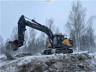 Volvo EC250ENL with 12 implements